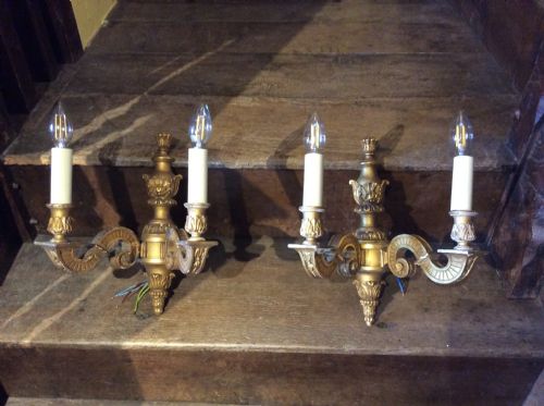 a pair of wood gilt twin light brackets