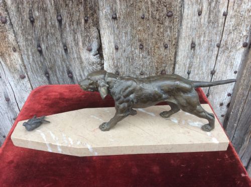 a 20thc bronze of a working dog on marble plinth
