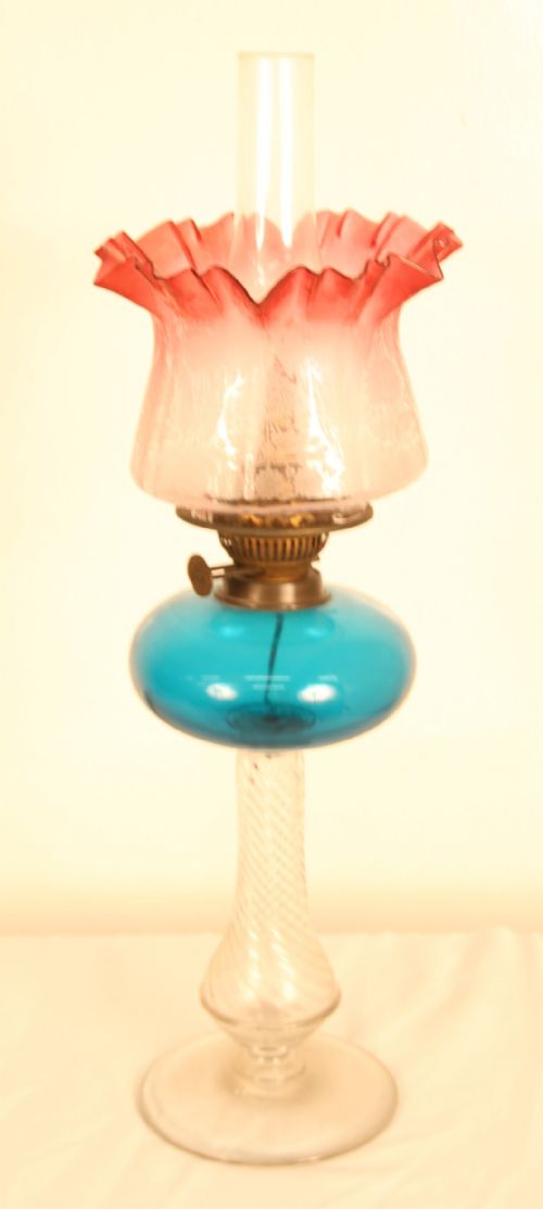 victorian oil lamp with cranberry glass shade