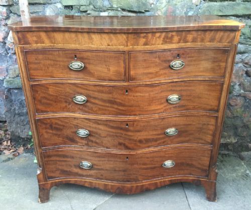 c19th mahogany serpentine chest