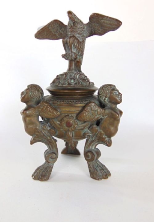 a bronze standish