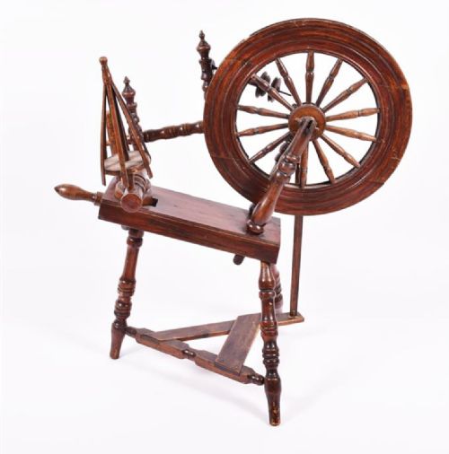 an early c19th oak spinning wheel