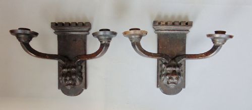 pair of carved wooden wall lights