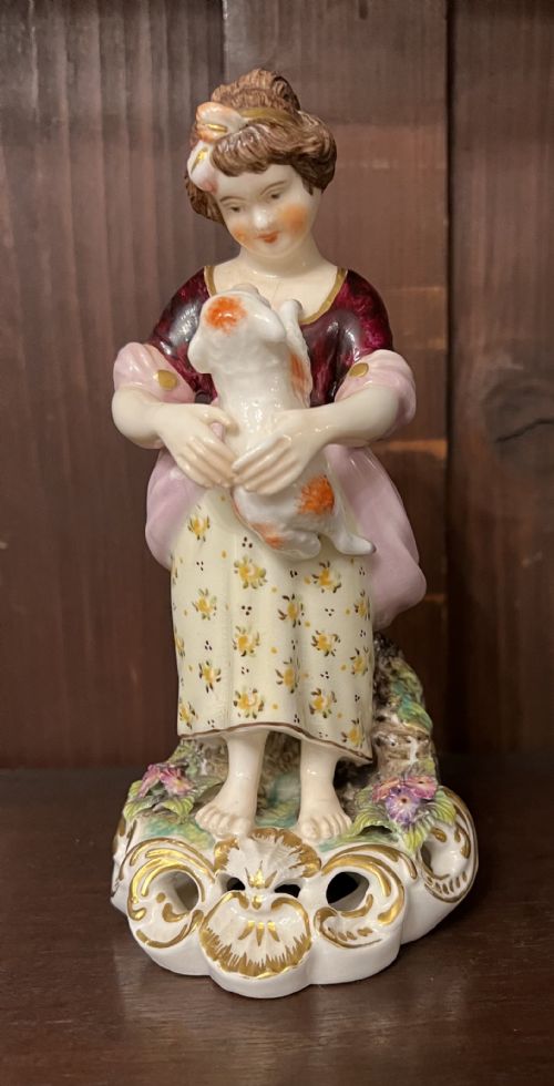 derby figure of young girl with dog