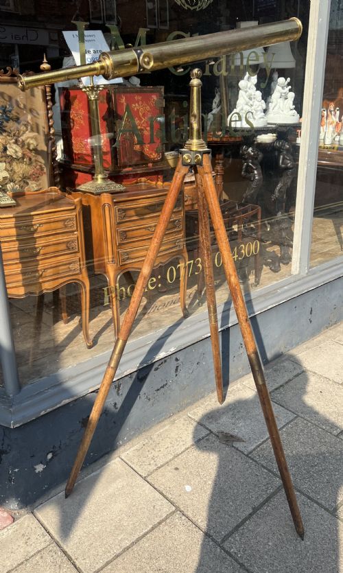 a large broadhurst clarkson co london terrestrial telescope on tripod base