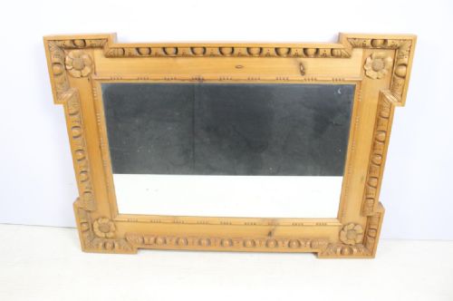 c19th pitch pine carved frame with a mirror
