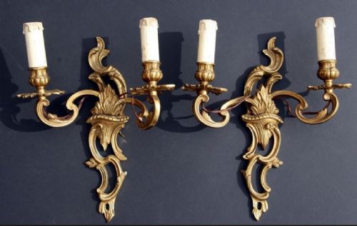 pair of gilt metal rococo wall lights