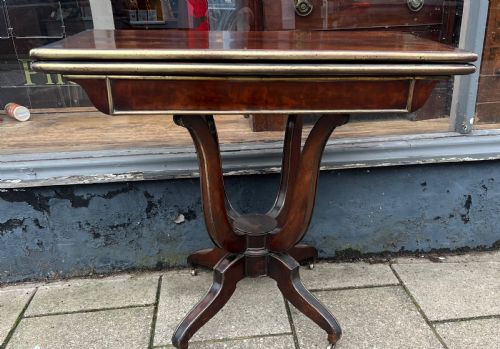 mahogany and brass decorated card table