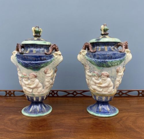 pair of majolica urns and covers