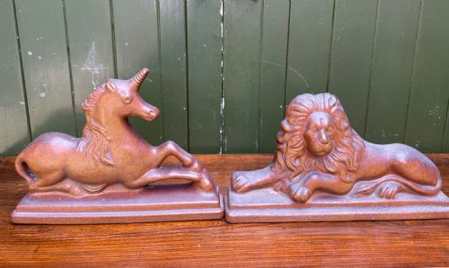 pair of c19th saltglazed stoneware ornamental studies of the lion and unicorn representing the union of england and scotland designed as doorporters
