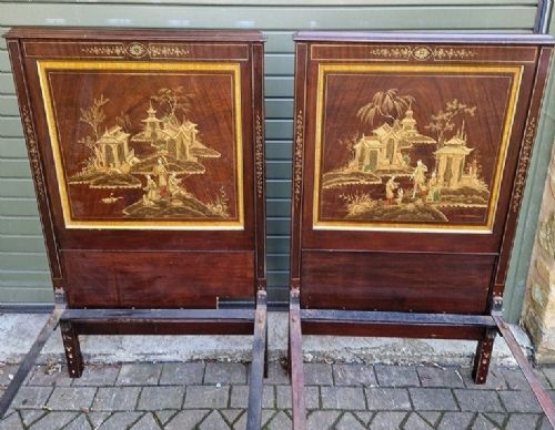 fig 1. A pair of Edwardian dark walnut single bedsteads and a matching chair featuring gilded Chinoiserie landscape panels.