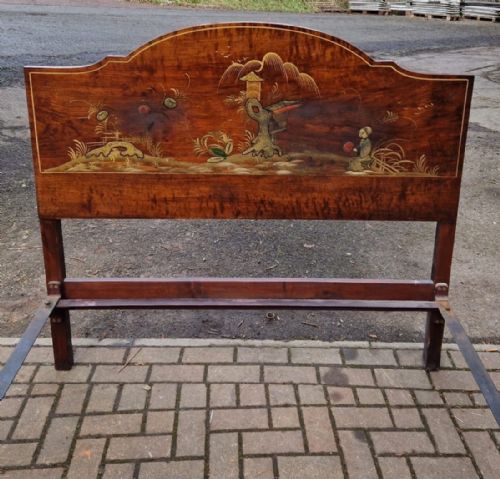 fig 1. A four-piece Edwardian walnut bedroom suite decorated with gold Chinoiserie scenes, consisting of a bedstead, tall wardrobe, dressing table, and chest of drawers.