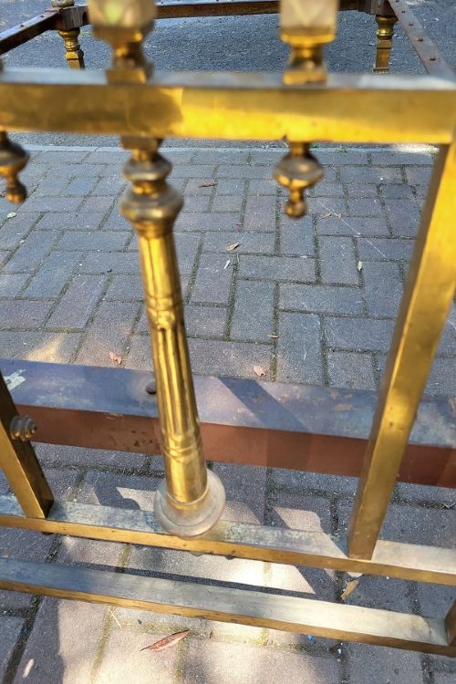 Victorian double size brass half tester bedstead featuring ornate floral cresting, urn finials, and reeded posts. View VII
