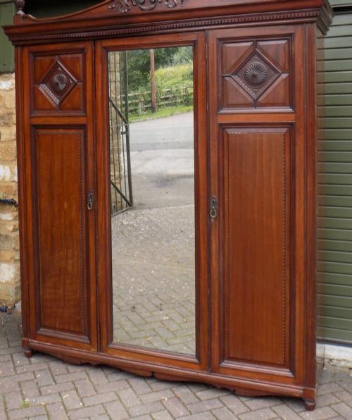 LATE VICTORIAN MAHOGANY TRIPLE DOOR WARDROBE