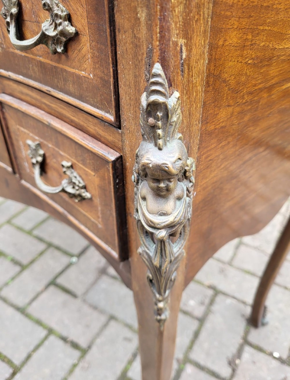 A French Louis XV style walnut poudreuse with parquetry top panels, serpentine front, drawer handles, and bronze ormolu mounts on cabriole legs. View III