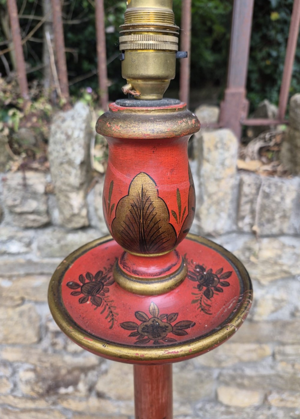 An antique Edwardian crimson standard lamp featuring hand-painted gold Chinoiserie foliage detailing and a circular base. View II