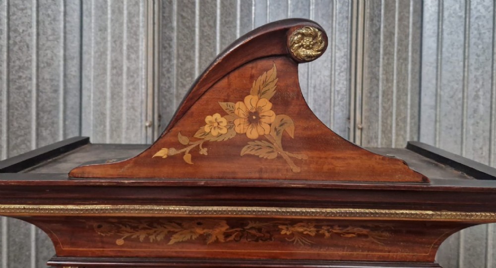 A Victorian inlaid walnut side cabinet featuring a mirror-backed upper section with a central glazed door, floral marquetry inlay, and cabriole legs. View III