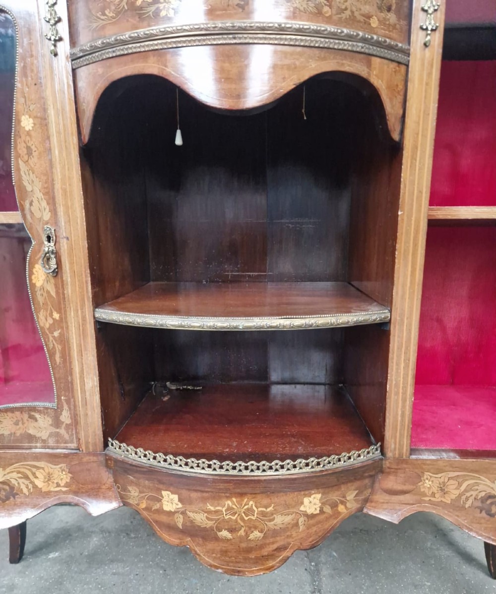 A Victorian inlaid walnut side cabinet featuring a mirror-backed upper section with a central glazed door, floral marquetry inlay, and cabriole legs. View V