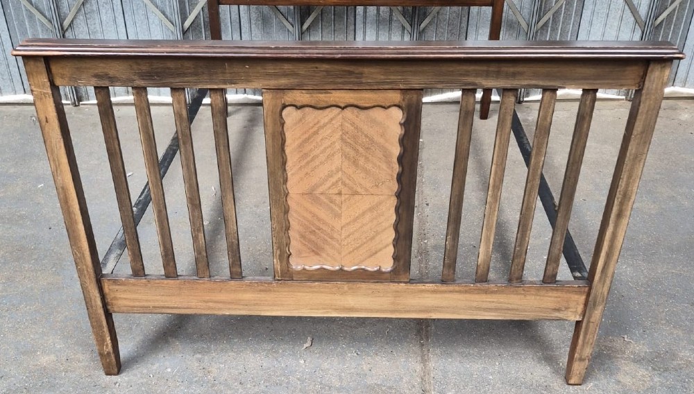 An Edwardian mahogany double bedstead featuring vertical slatted sides and a central parquetry chevron panel on both the headboard and footboard. View III