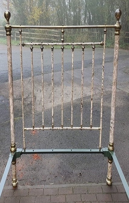A Victorian brass and painted iron bedstead featuring turned vertical spindles, brass top rails, and spherical brass finials. View III