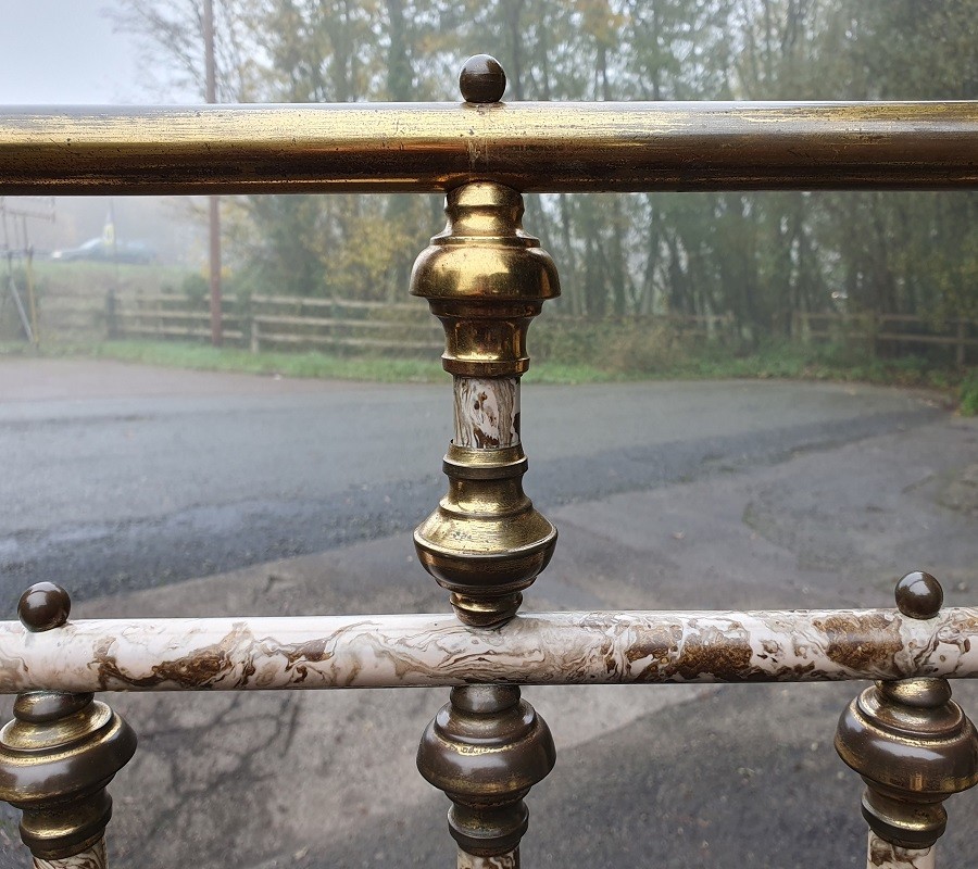 A Victorian brass and painted iron bedstead featuring turned vertical spindles, brass top rails, and spherical brass finials. View IV