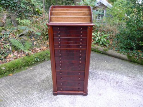 fig 2. A SUPERB 16 GRADUATED DRAWER COLLECTORS CABINET WITH CASCADE DISPLAY TOP. CIRCA 1880.