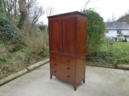 fig 1. A SUPERB SOLID MAHOGANY LINEN PRESS OVER DRAWERS CIRCA 1840