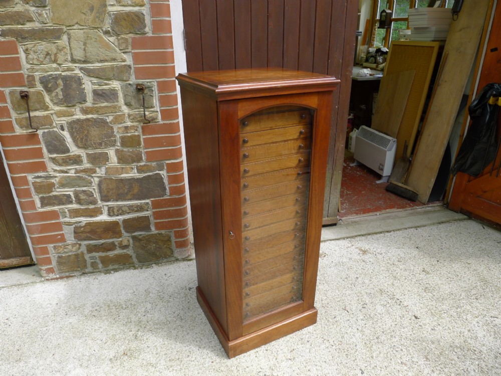 A GOOD POLISHED WALNUT 18 DRAWER LATE VICTORIAN COLLECTORS CABINET CIRCA 1890.