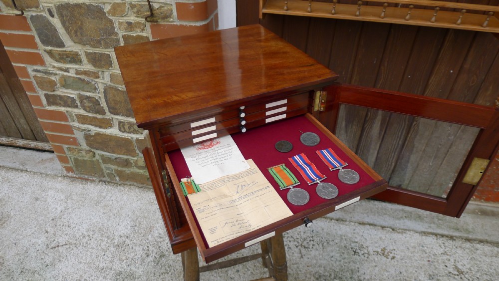 A SUPERB QUALITY, SOLID MAHOGANY MEDAL COLLECTORS CABINET ATTRIBUTED TO MESSRS HOLLAND & SONS. CIRCA 1900. View X