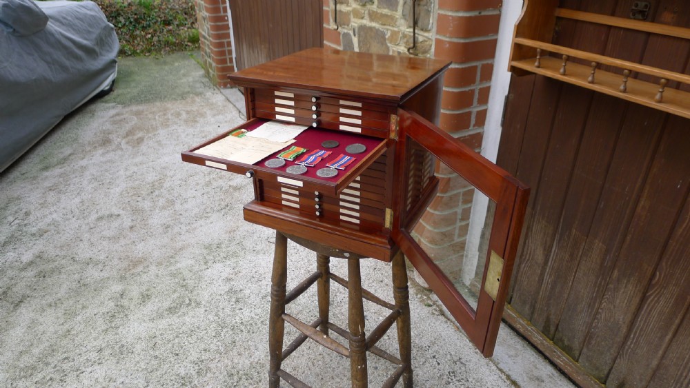 A SUPERB QUALITY, SOLID MAHOGANY MEDAL COLLECTORS CABINET ATTRIBUTED TO MESSRS HOLLAND & SONS. CIRCA 1900. View XIII