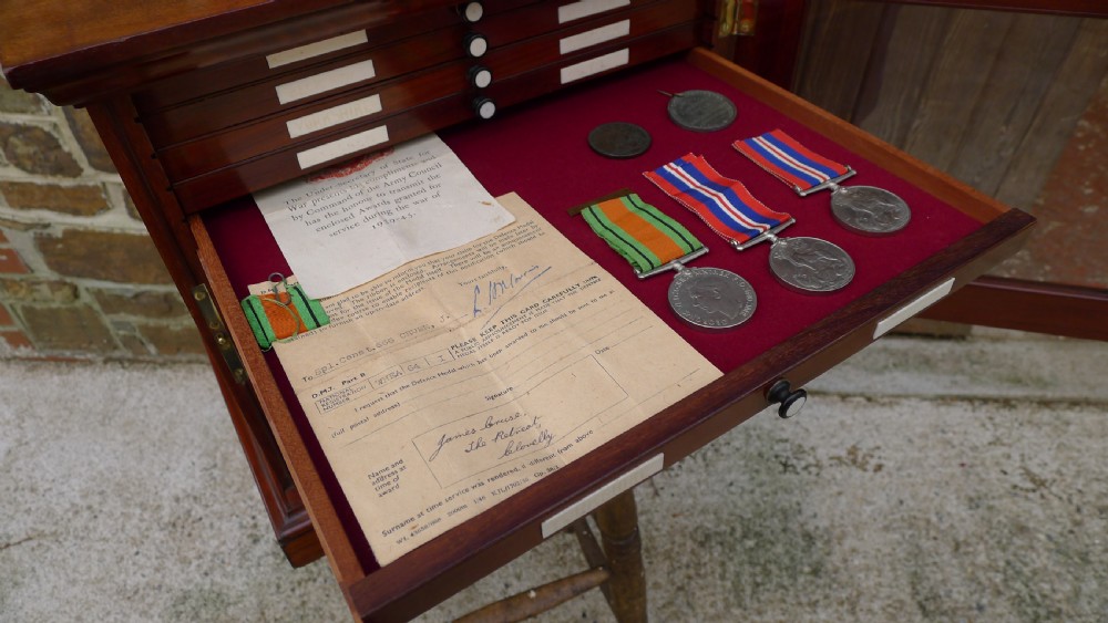 A SUPERB QUALITY, SOLID MAHOGANY MEDAL COLLECTORS CABINET ATTRIBUTED TO MESSRS HOLLAND & SONS. CIRCA 1900. View XIV
