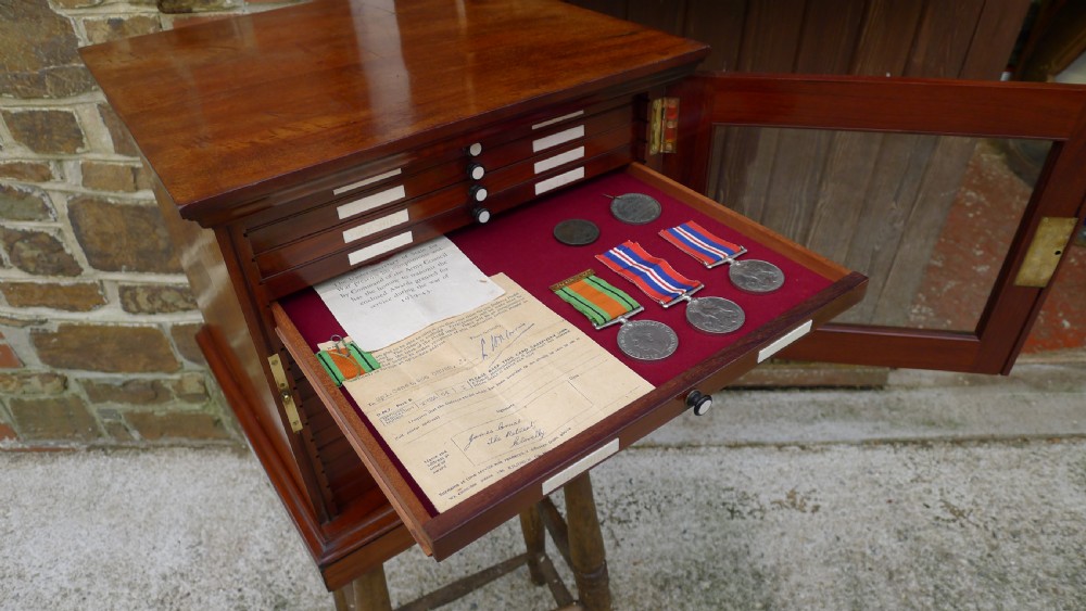 A SUPERB QUALITY, SOLID MAHOGANY MEDAL COLLECTORS CABINET ATTRIBUTED TO MESSRS HOLLAND & SONS. CIRCA 1900. View XV
