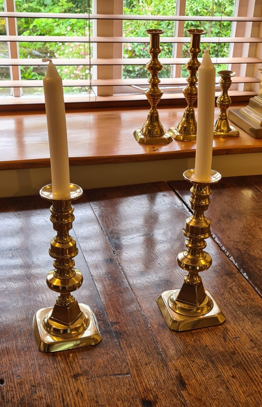 A BEAUTIFUL PAIR OF BRASS EJECTOR CANDLE STICKS CIRCA 1870