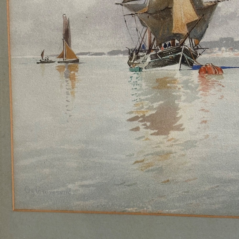 A pair of antique framed maritime prints featuring sailing vessels on calm waters framed in dark wooden moulding with gilt trim. View III