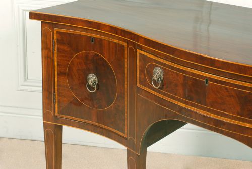 fig 1. Smart Sheraton revival serpentine mahogany sideboard in immaculate condition.