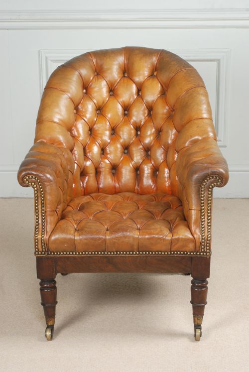 fig 1. A Fine William IV mahogany and leather library chair