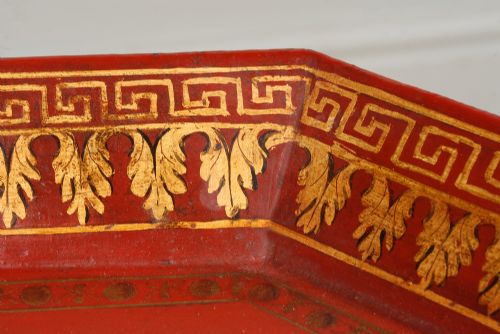 fig 3. A REGENCY RECTANGULAR SCARLET GROUND PAINTED METAL TRAY