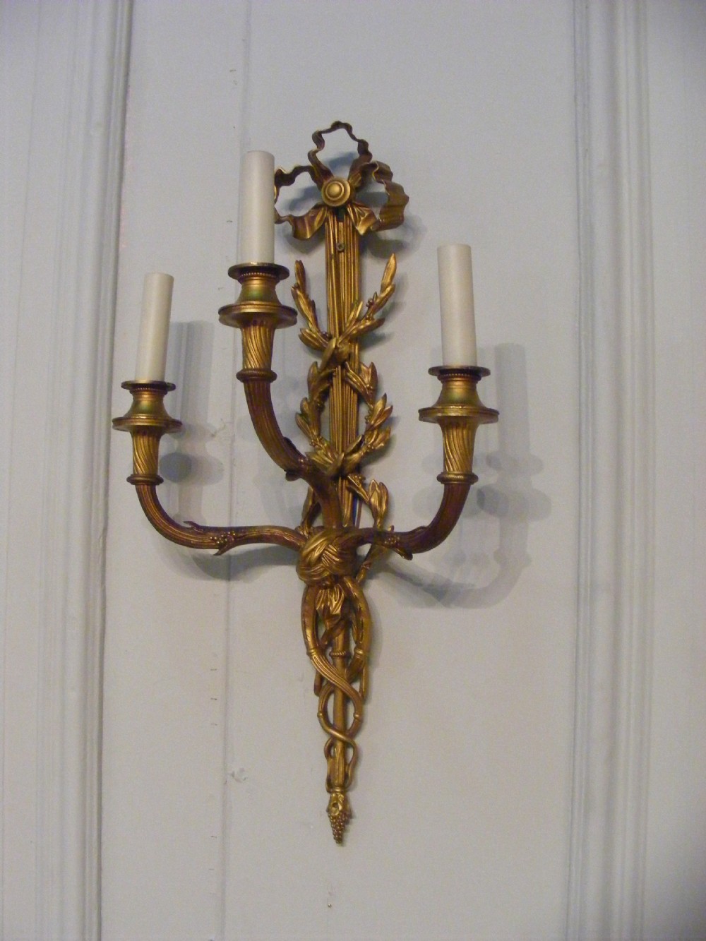 Superb pair of large gilt bronze wall lights