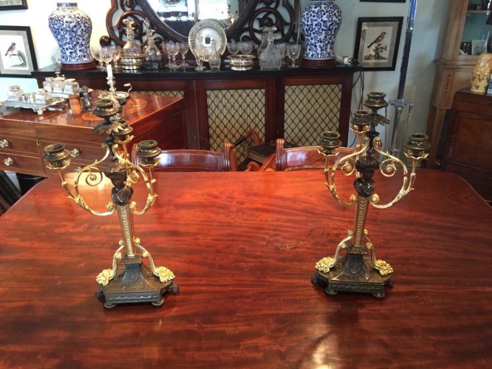 Fine pair of ormolu and bronze empire candelabra.