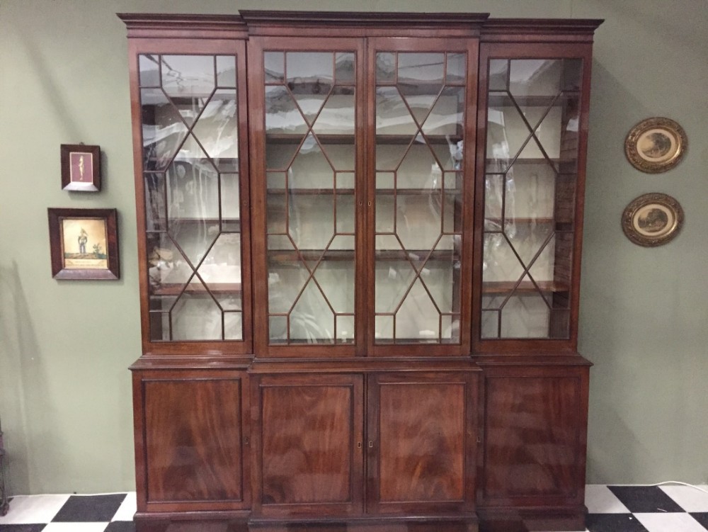 George III mahogany break front bookcase