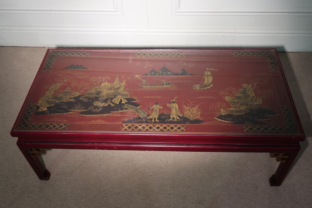 A superb Chinoiserie tea (coffee) table with glass top in excellent condition.
