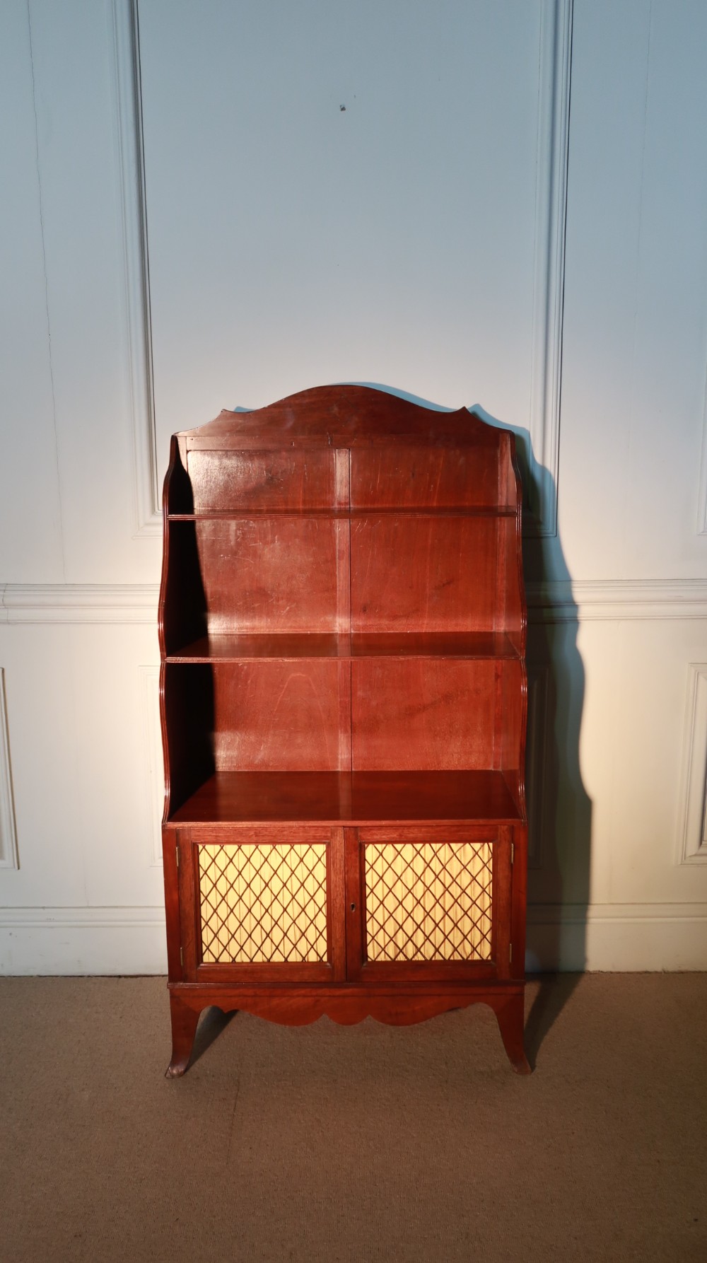 Fine quality Regency waterfall bookcase