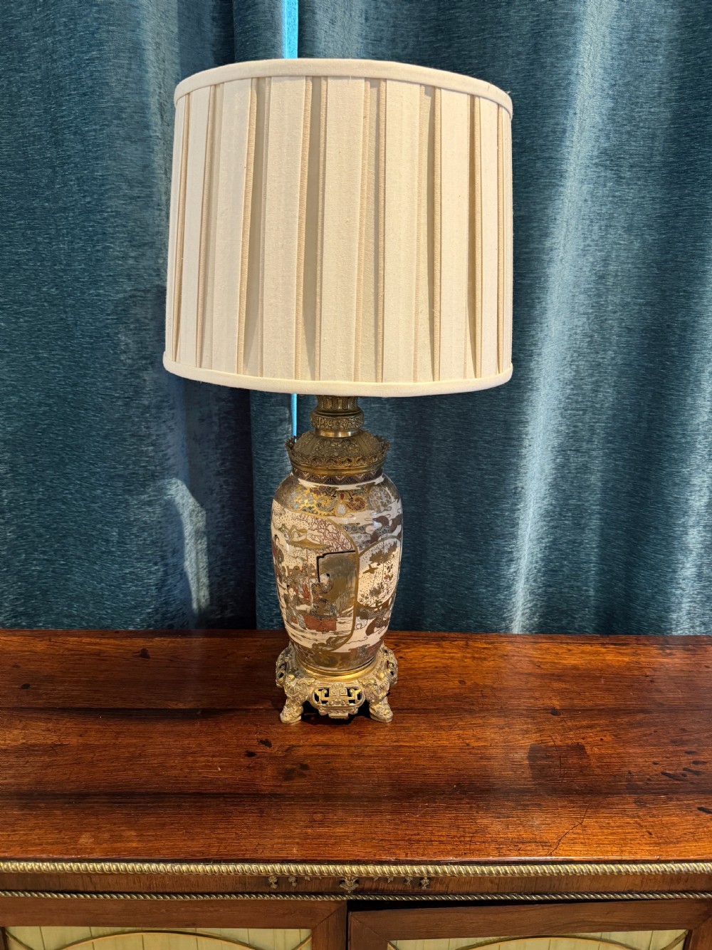 A late 19th-century Japanese Satsuma ceramic vase fitted as a table lamp, featuring detailed figurative enamel paintings and gilded ormolu bases and mounts. View III