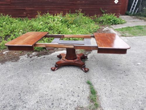 Unusual Regency Mahogany Central Pillar Extending Dining Table.