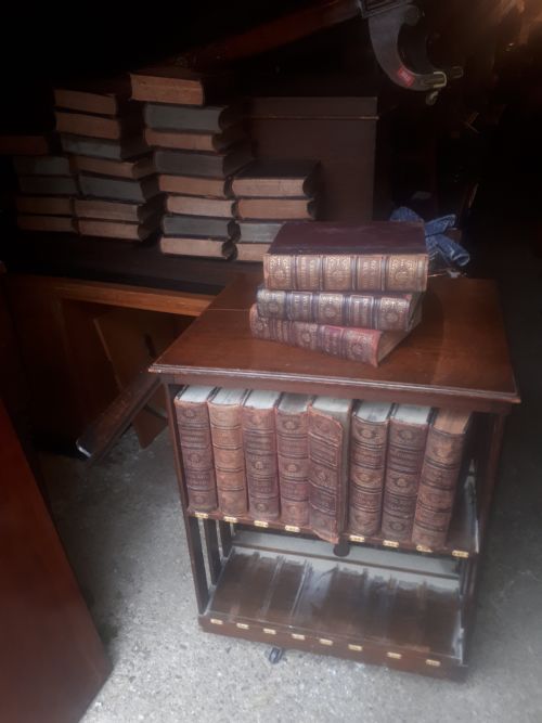 Encyclopedia Britannica Revolving Bookcase with a Complete Set of Books