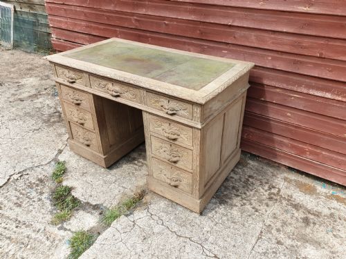 Early 20th Century Carved Oak Kneehole Pedestal Desk