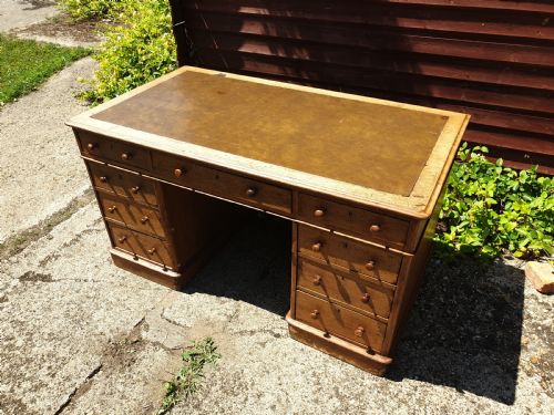 Late Victorian Oak Kneehole Pedestal Desk of Good Size.