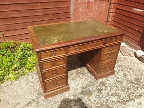 Mid 19th Century Mahogany Kneehole Pedestal Desk.