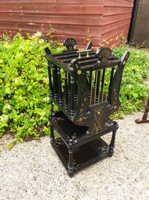 Victorian Ebonised and Gilt Canterbury Table.