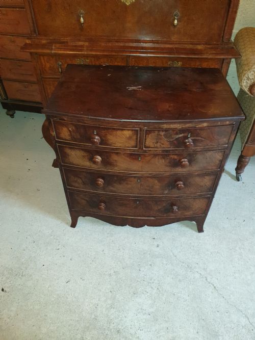 Diminutive Mahogany Bow Front Chest.